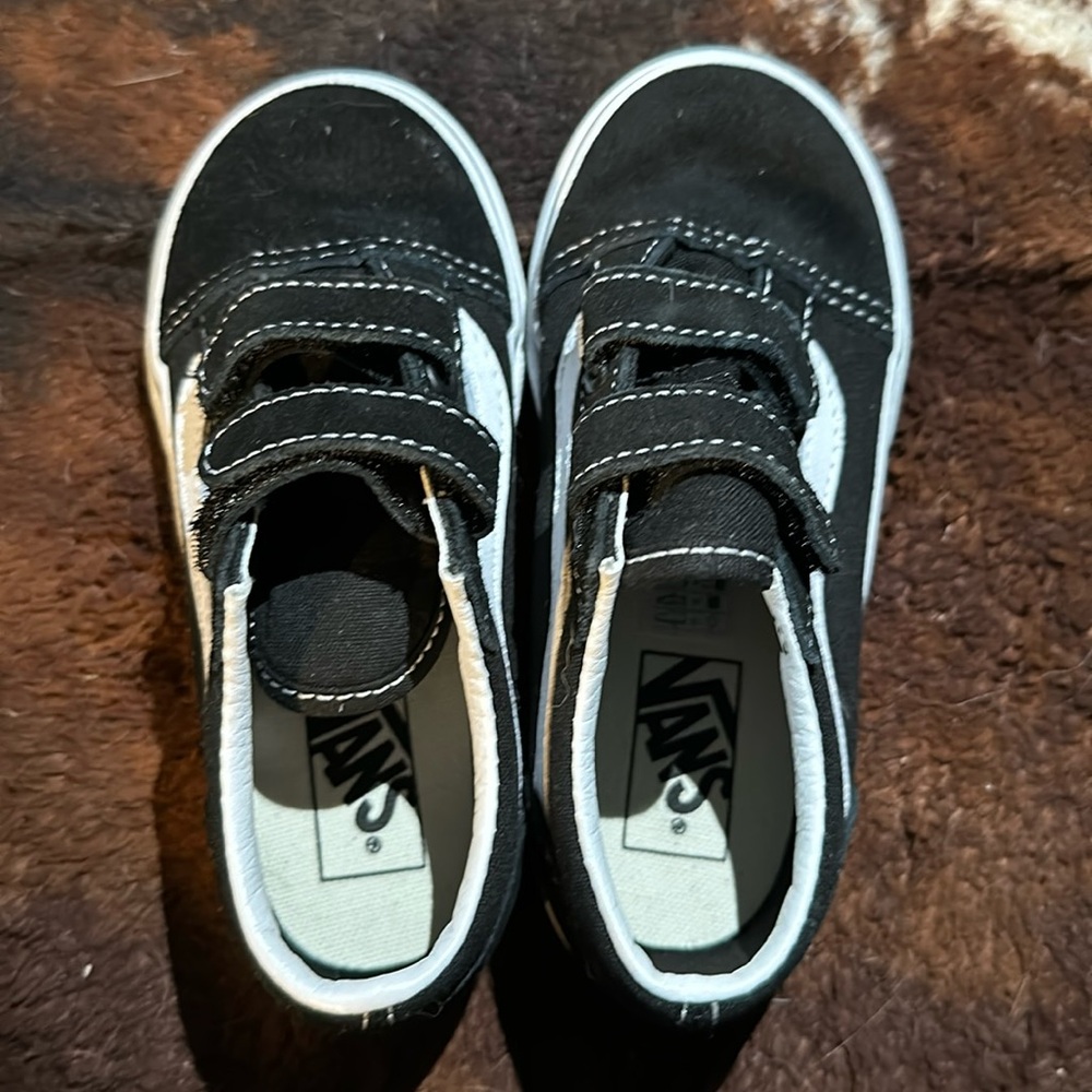 Little girls Vans.